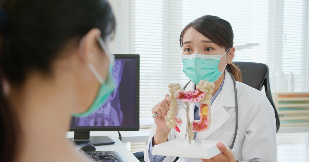 female doctor showing colonoscopy results