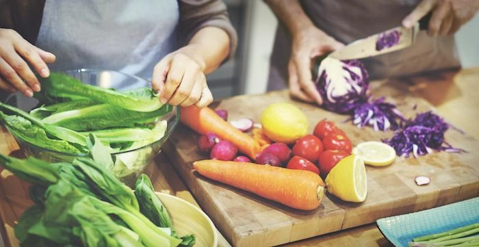 A couple preparing healthy food