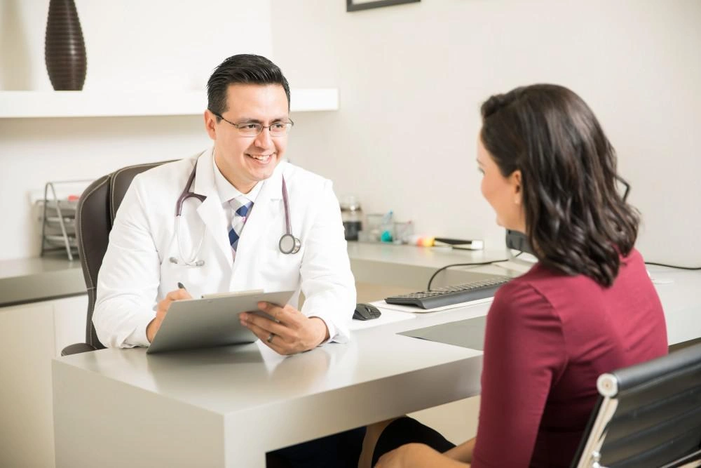 Woman consulting a doctor