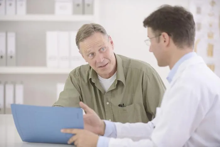 Man consulting a doctor