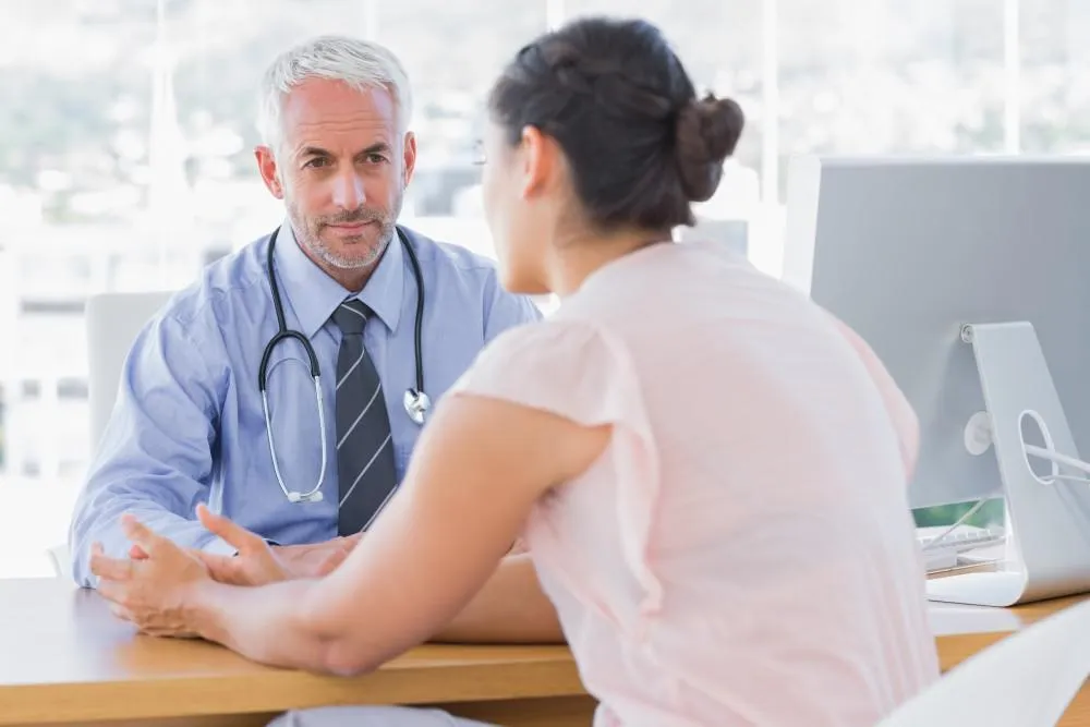 Doctor talking to the patient