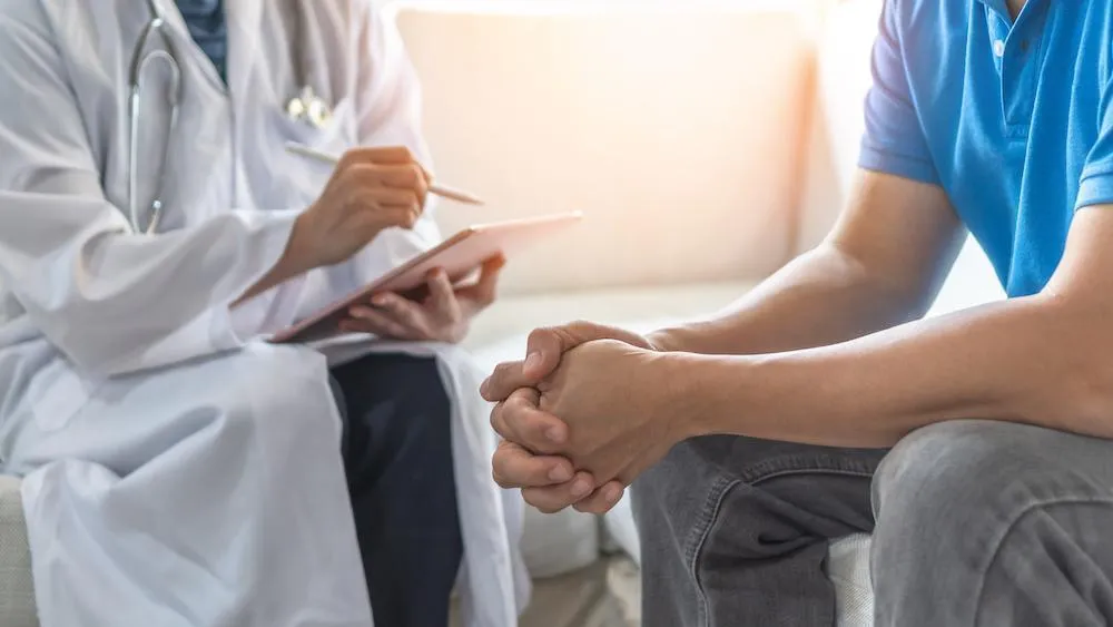 Doctor talking to the patient