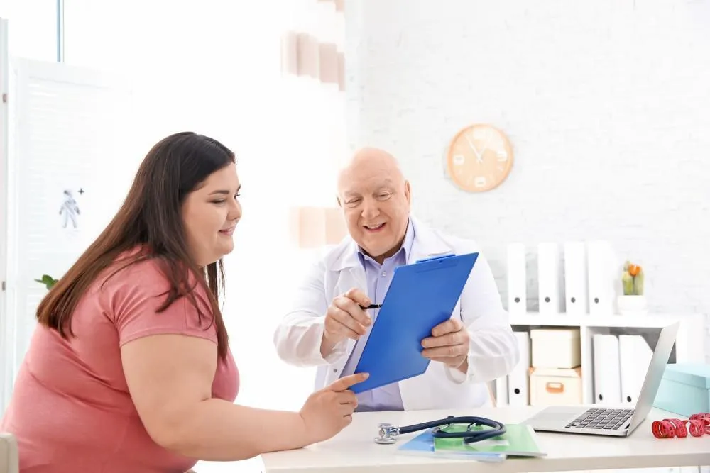 Obese Woman Consulting with the Doctor