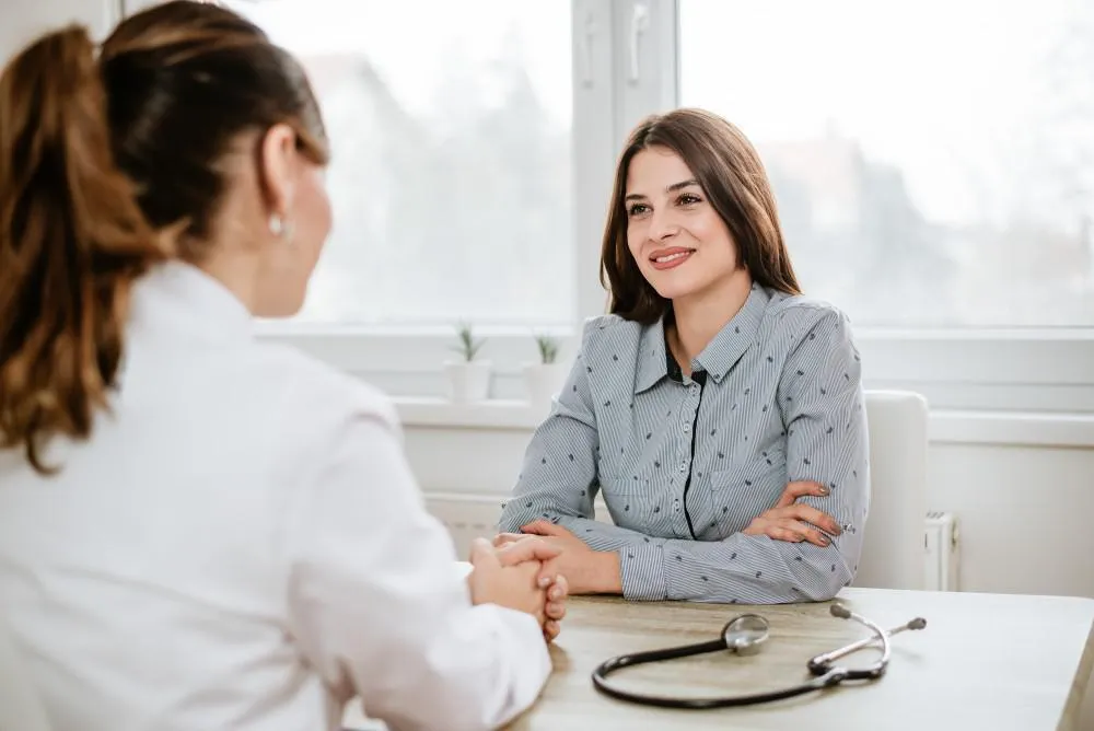 Woman doctor explaining to the patient