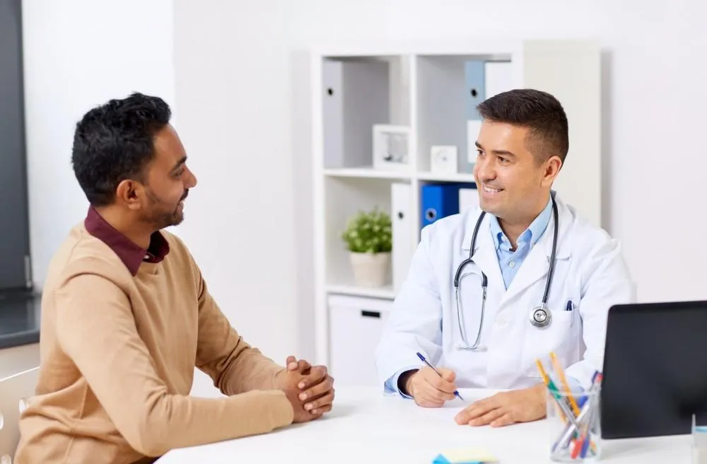 Doctor talking to the patient