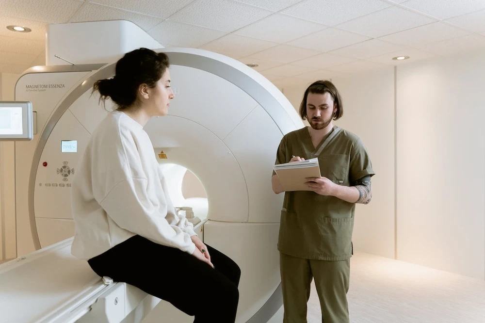 Woman in an examination room with a doctor