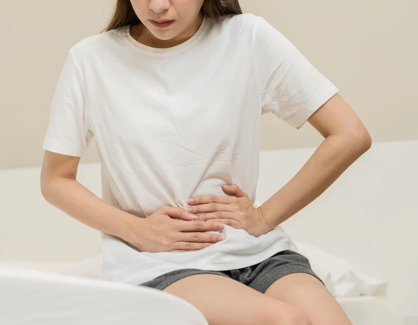 Woman having abdominal pain